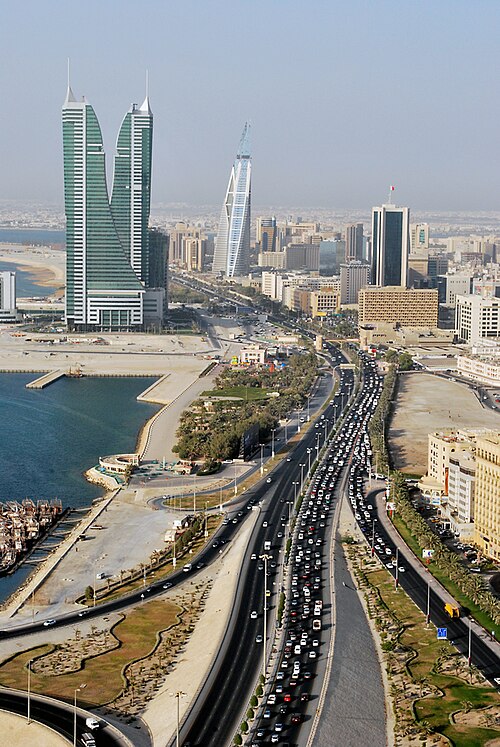 Fayl:Road and towers in Manama.jpg