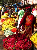 Madivala bozoridagi gul sotuvchilari, Bangalor, Hindiston