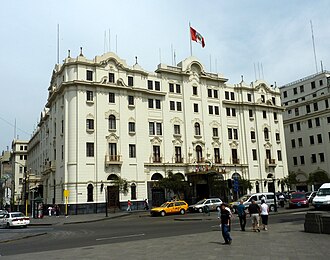 Photograph of a white five-story building
