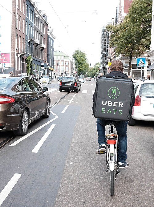 Fayl:UberEats cyclist in Amsterdam.jpg