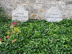 Two graves and two gravestones side by side; heading behind a bed of green leaves, bearing the remains of Vincent and Theo van Gogh, where they lie in the cemetery of Auvers-sur-Oise. The stone to the left bears the inscription: Ici Repose Vincent van Gogh (1853-1890) and the stone to the right reads: Ici Repose Theodore van Gogh (1857-1891)