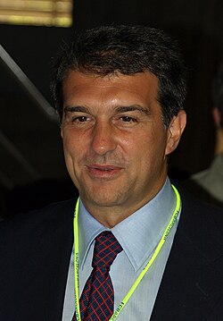 suntanned man in business suit with smiling happily