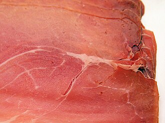 Prosciutto jambonlari pushti rangini mioglobin tabiiy oqsili bilan birlashtirilgan tuzdan oladi.
