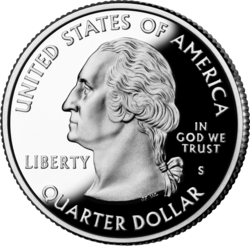 Shiny silver coin with profile of Washington bust.