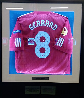 A red Liverpool shirt with the number eight and Gerrard’s name on the back
