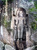 Qoyaga o‘yilgan Avalokiteshvara haykali, Weligama, Shri-Lanka.