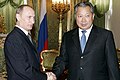 Rossiya prezidenti Vladimir Putin va sobiq Qirgʻiziston prezidenti Qurmanbek Bakiyev.