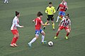 2014–2015-yilgi mavsum Ayollar birinchi ligasi o'yini, jamoalar: Atashehir Belediyespor (oq/qizil formada) - Adana İdmanyurduspor (qizil/ko'k formada)
